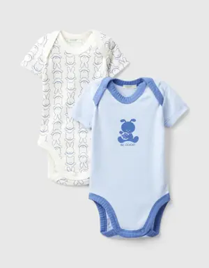 two short sleeve bodysuits in organic cotton