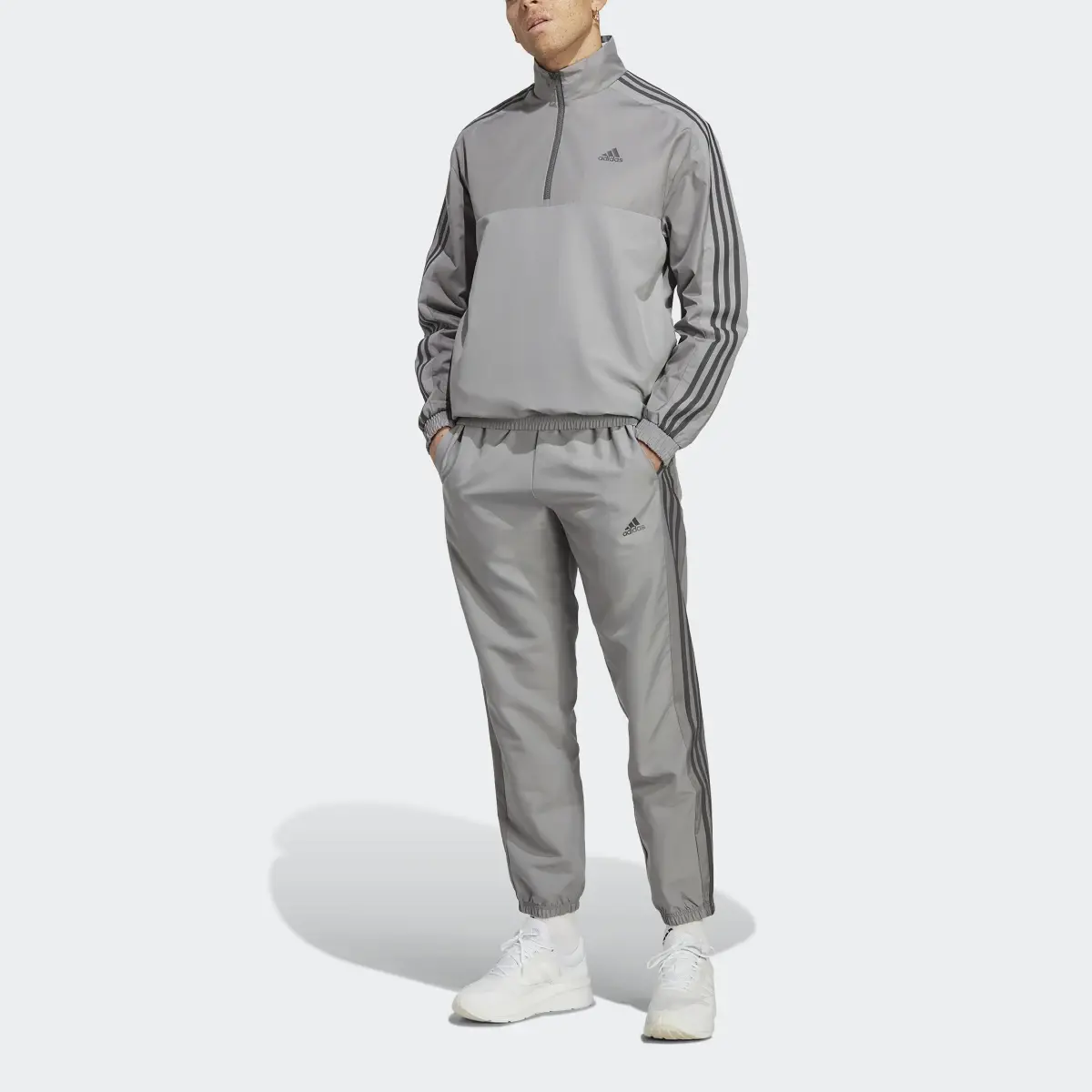 Adidas 1/4 Zip Woven Tracksuit. 1