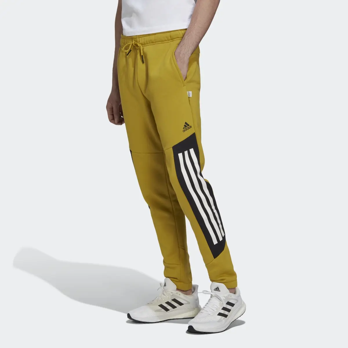 Adidas Calças em Fleece 3-Stripes Future Icons. 1