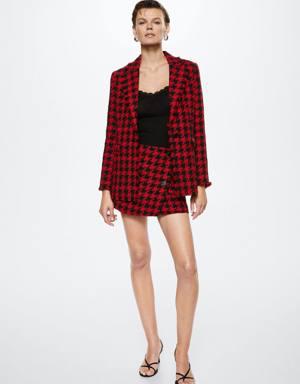 Houndstooth mini-skirt with buttons