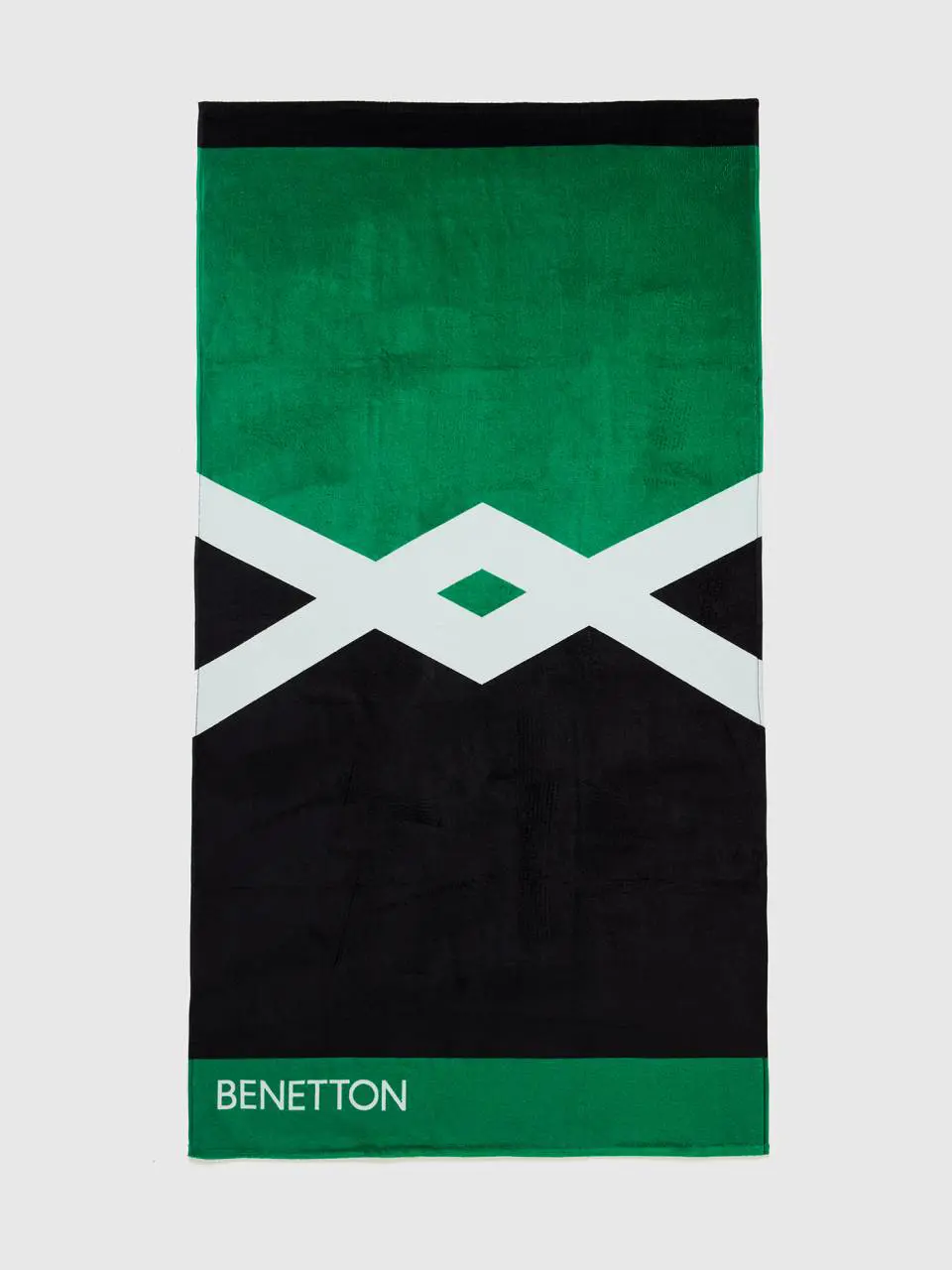 Benetton green and black beach towel. 1