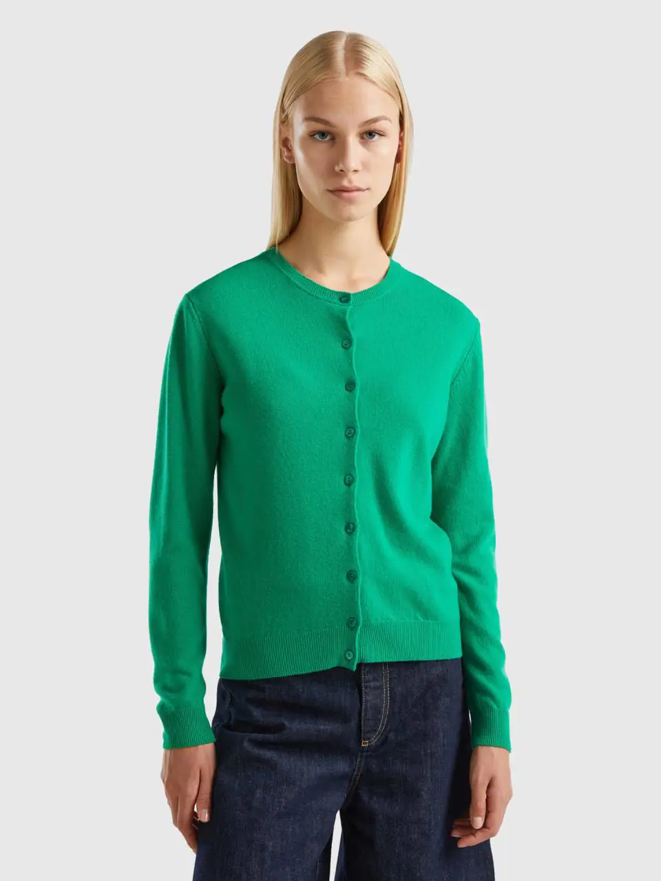 Benetton green crew neck cardigan in pure merino wool. 1