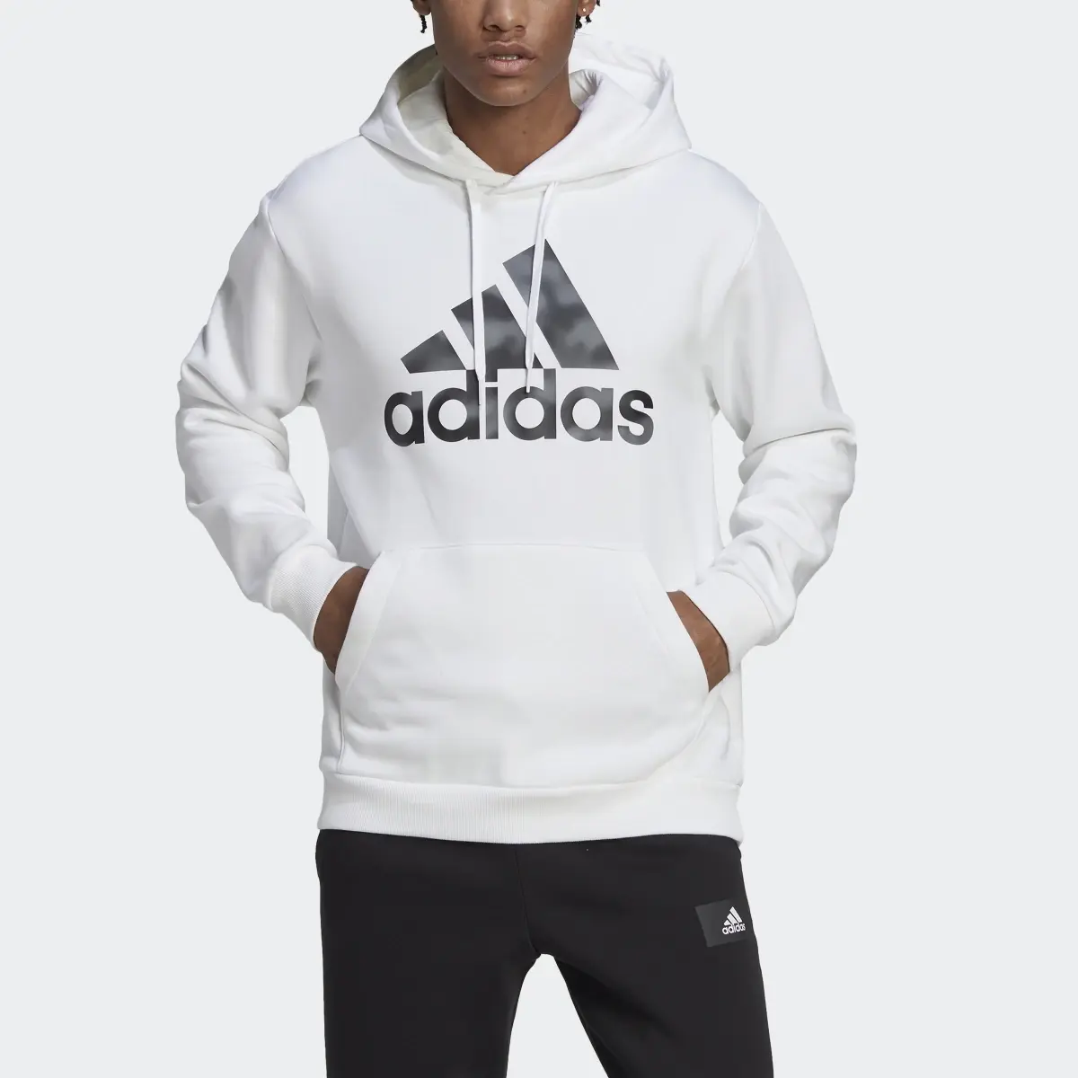 Adidas Essentials Camo Print French Terry Hoodie. 1