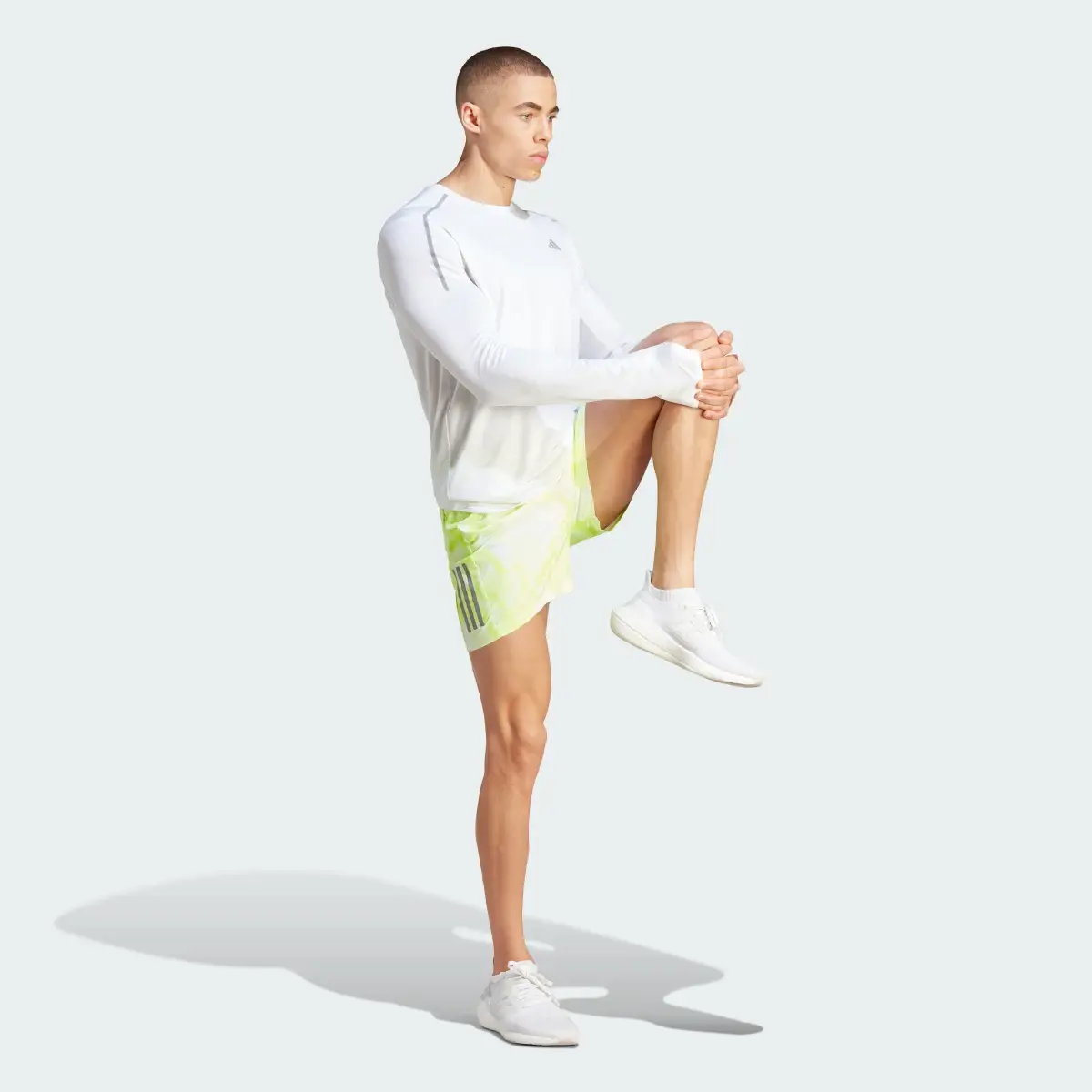 Adidas Own the Run Allover Print Shorts. 3