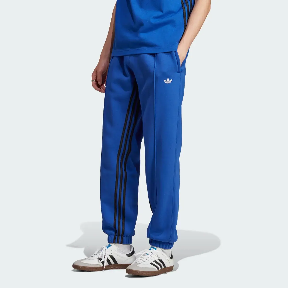 Adidas Rekive Jogginghose. 1