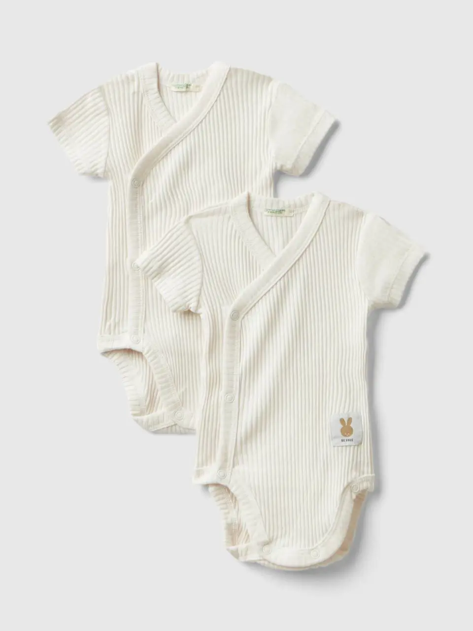 Benetton two short sleeve ribbed knit bodysuits. 1