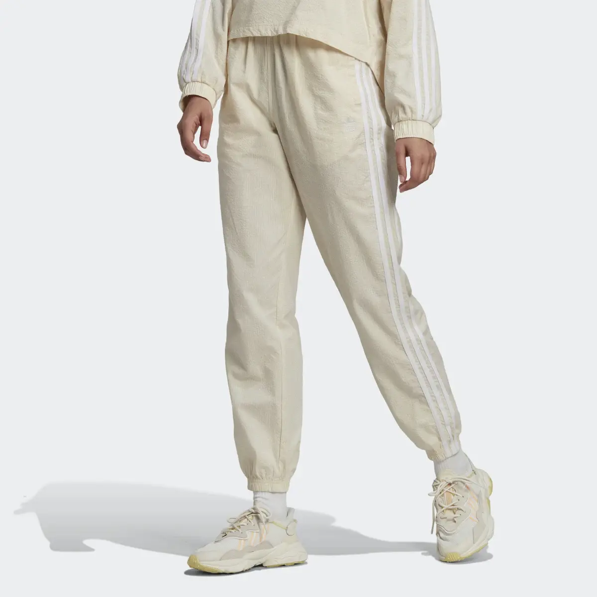 Adidas Pantalon de survêtement en popeline Adicolor Classics. 1