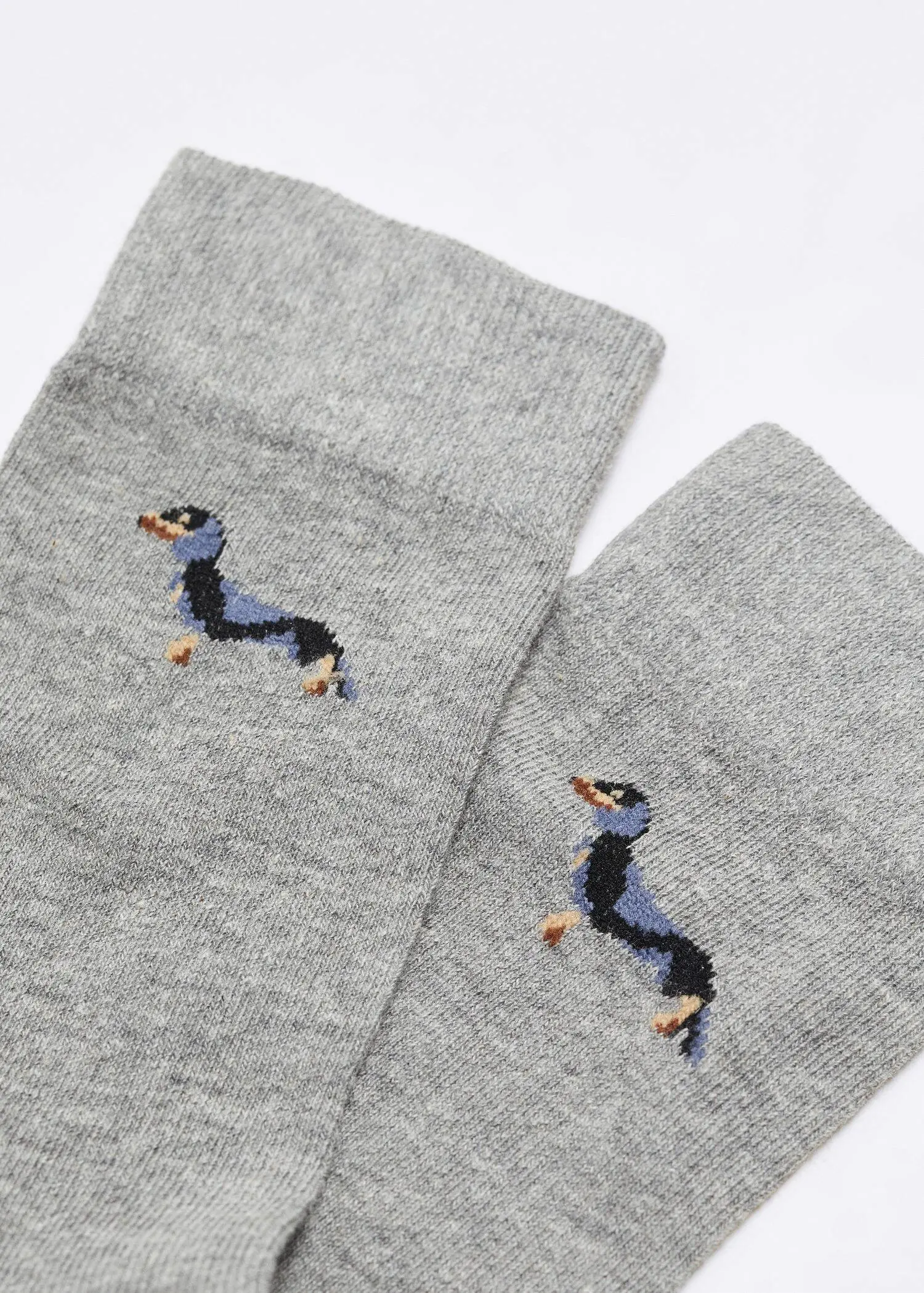 Mango Dog-embroidered cotton socks. a close up of a pair of socks 