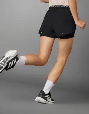 Adidas Short 2 en 1 Own the Run 3 bandes. 2