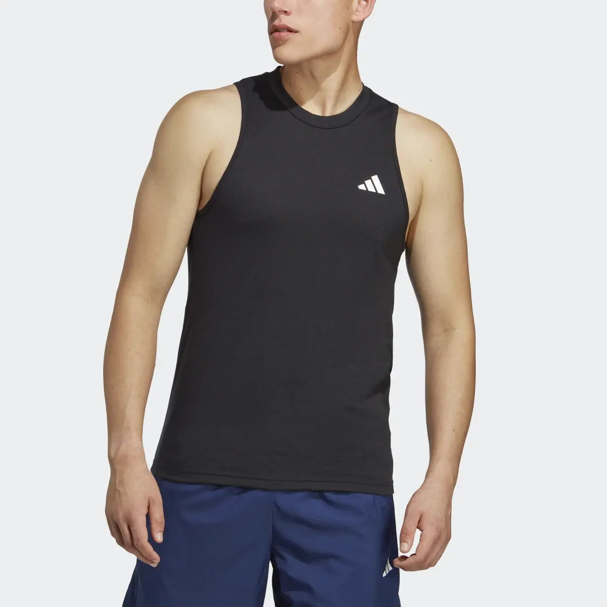 Adidas Playera Sin Mangas Train Essentials. 1