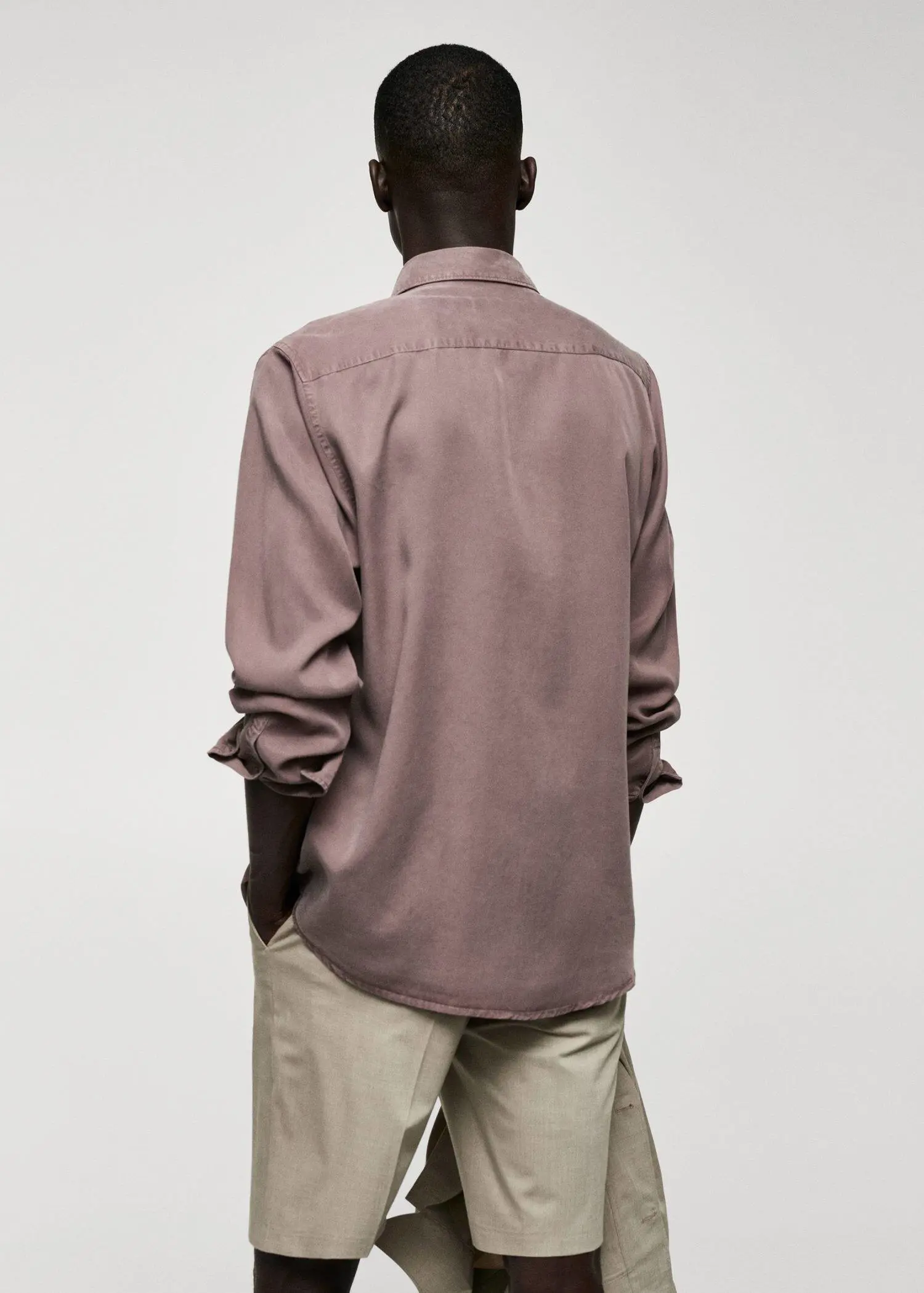 Mango Lyocell fluid shirt. a person wearing a brown shirt and khaki pants. 