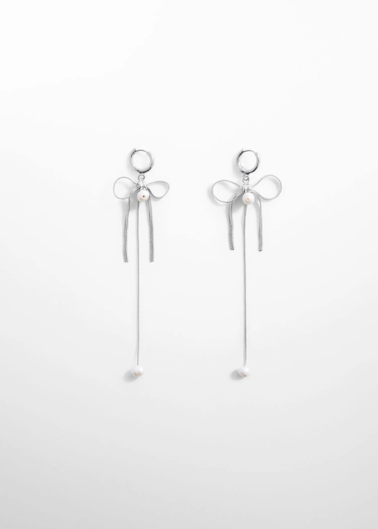 Mango Pearl bow earings. a pair of silver earrings with pearls hanging from them. 