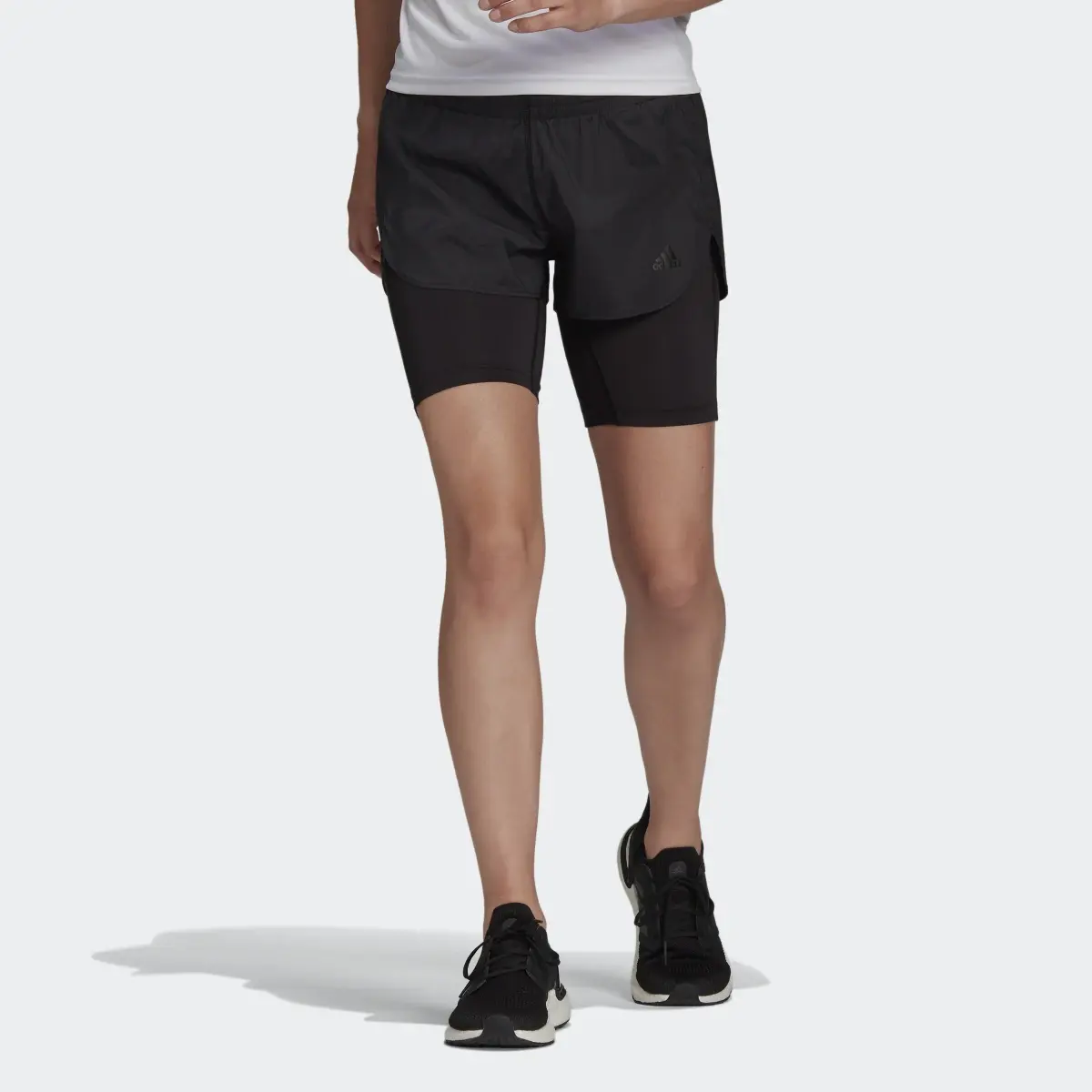 Adidas Pantalón corto Run Fast Two-in-One. 1