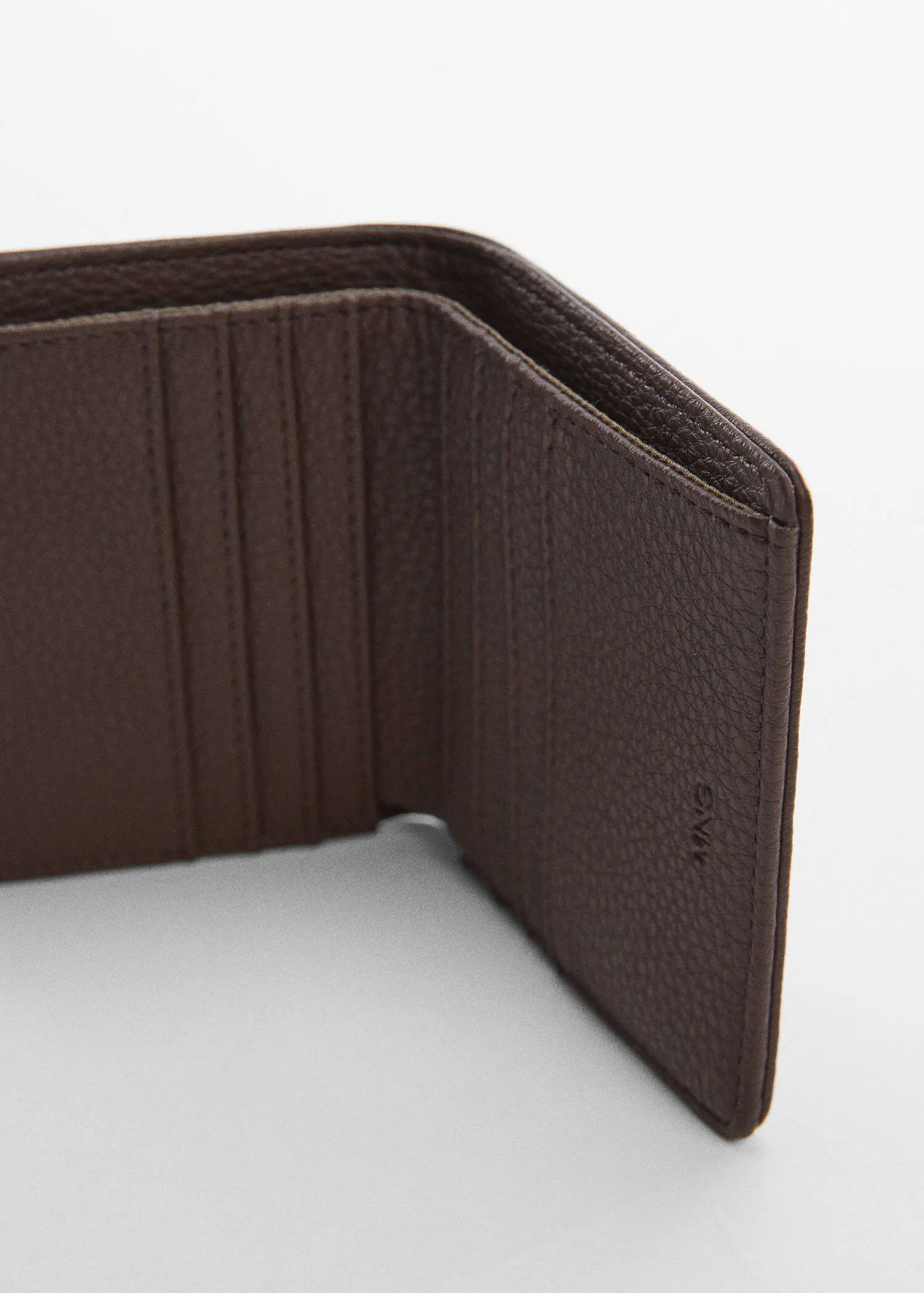 Mango Anti-contactless wallet. a close-up view of the inside of a brown wallet. 