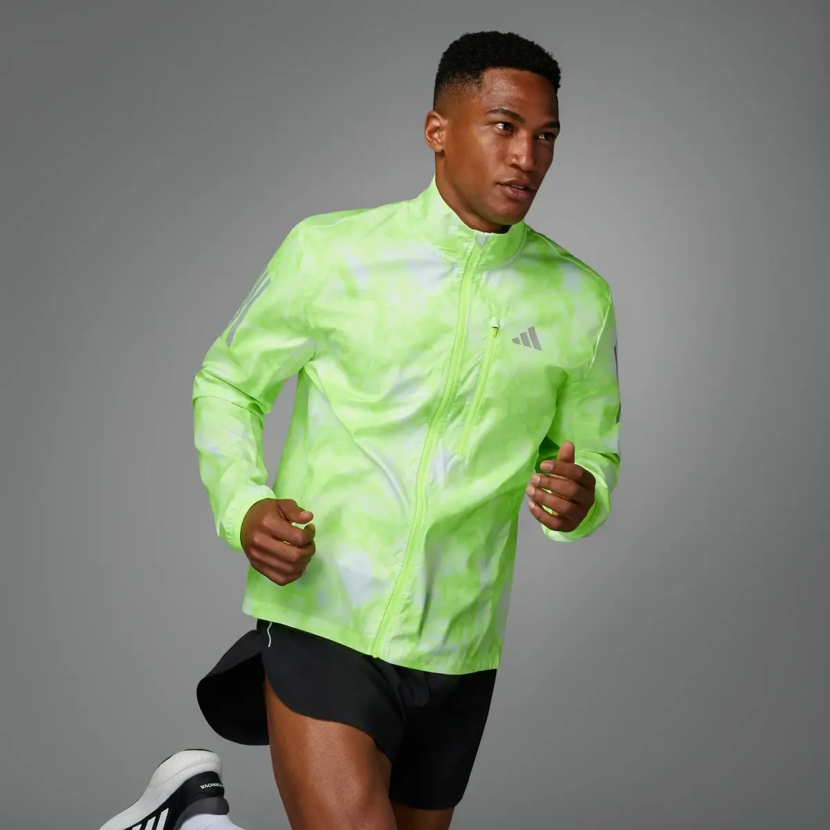 Adidas Own the Run Allover Print Jacket. 1