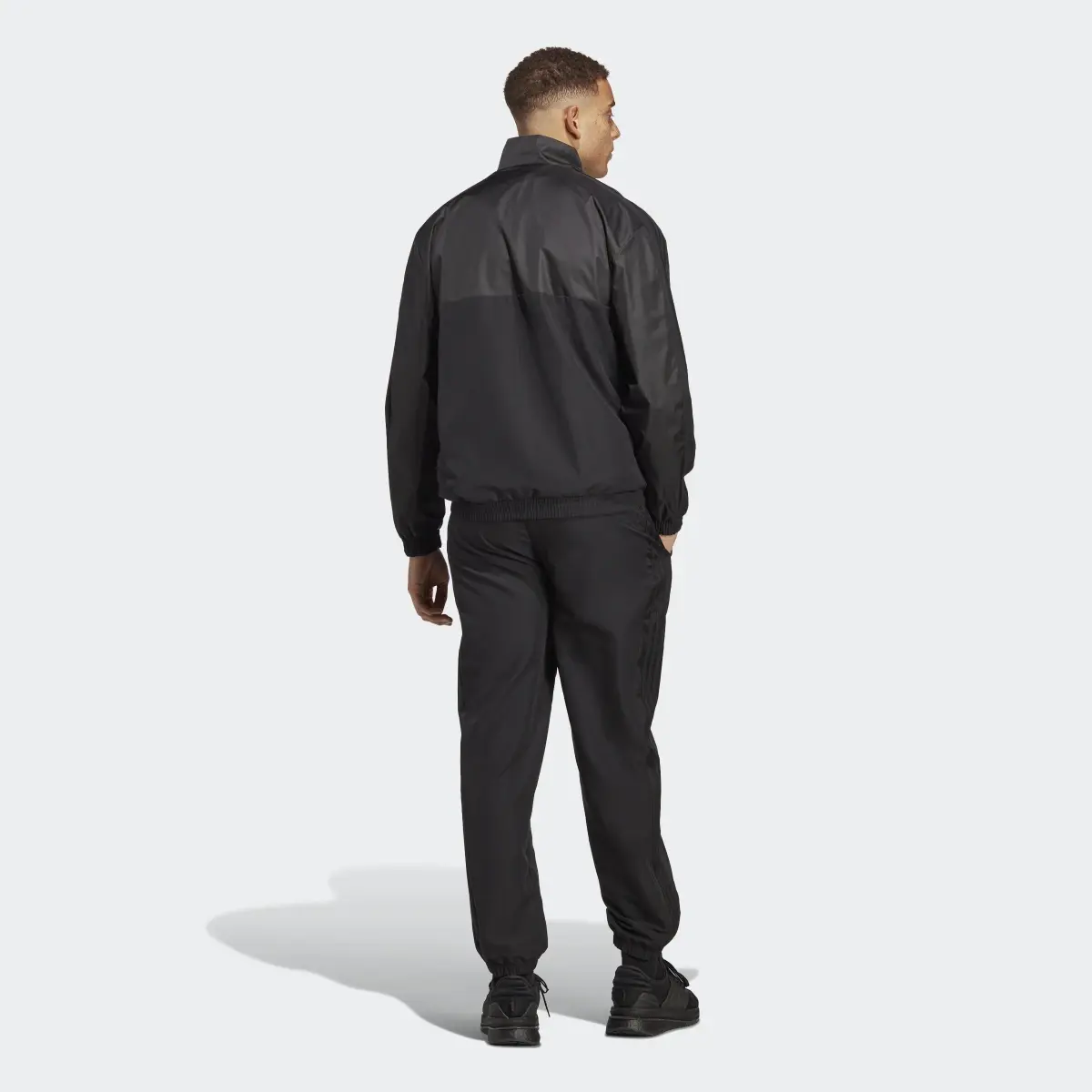 Adidas 1/4 Zip Woven Tracksuit. 3