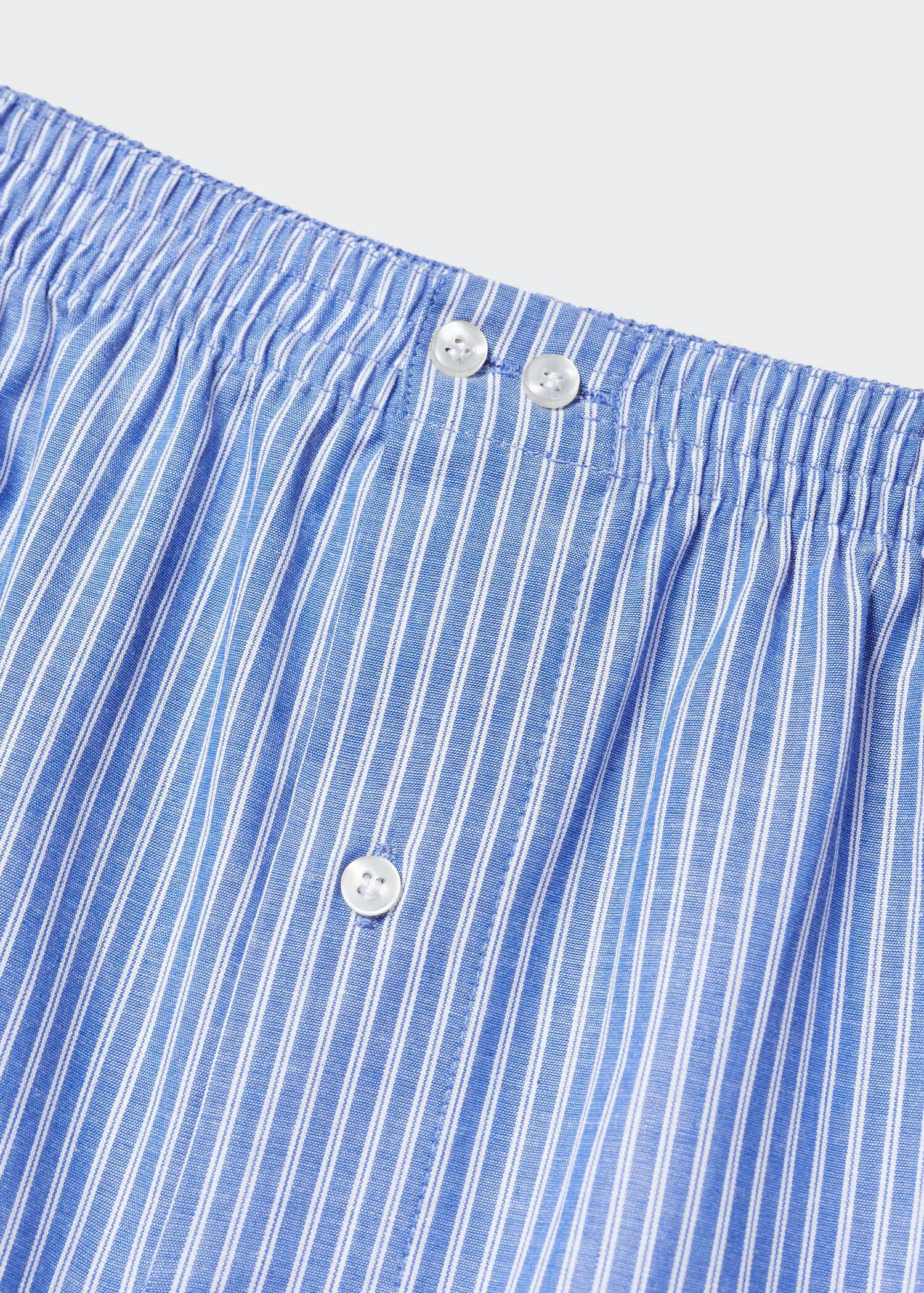 Mango 100% cotton striped briefs. a close up view of the buttons on the boxers. 