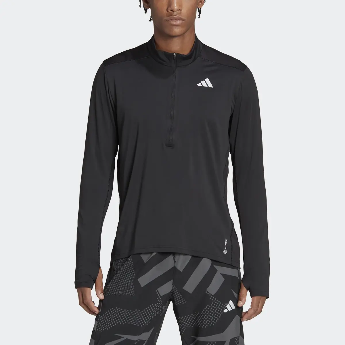 Adidas Own the Run 1/2 Zip Tee. 1