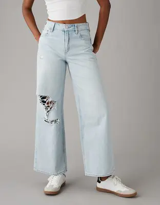 American Eagle Strigid Super High-Waisted Baggy Wide-Leg Ripped Ankle Jean. 1