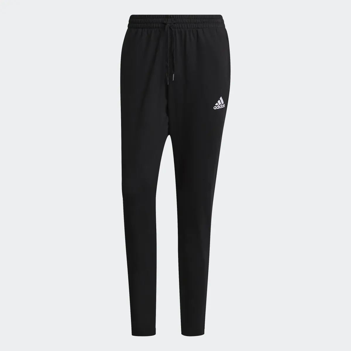 Adidas Essentials Tapered Joggers. 1