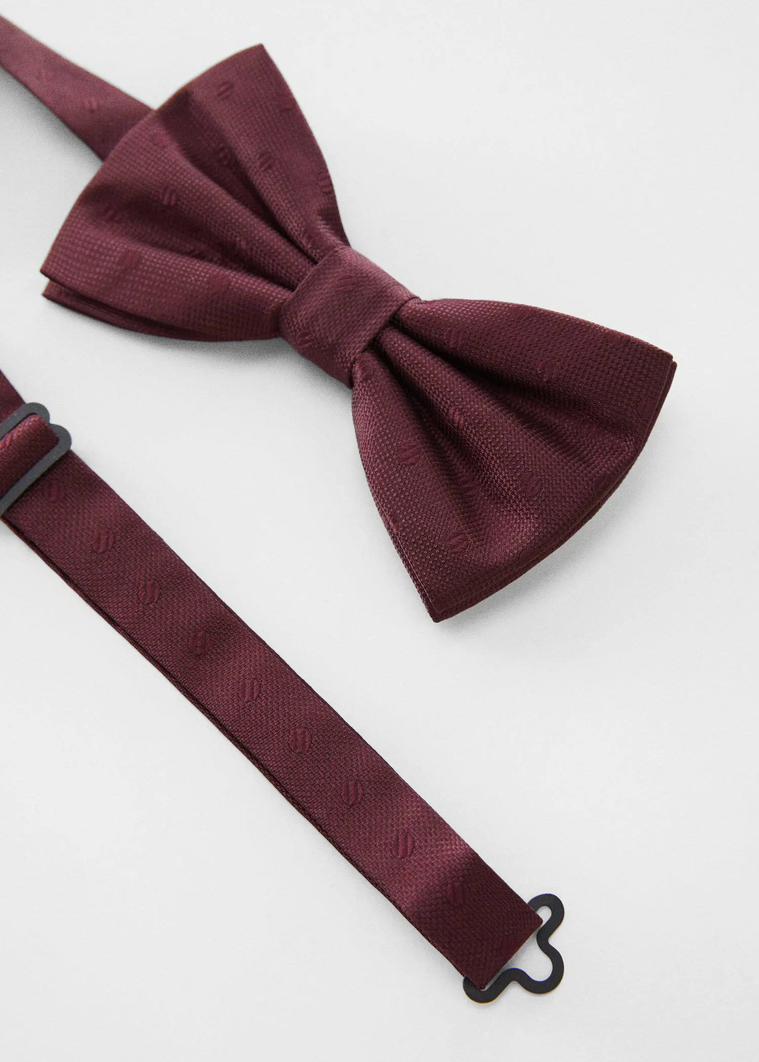 Mango Bow tie with polka-dot structure. a maroon bow tie and a maroon suspenders. 