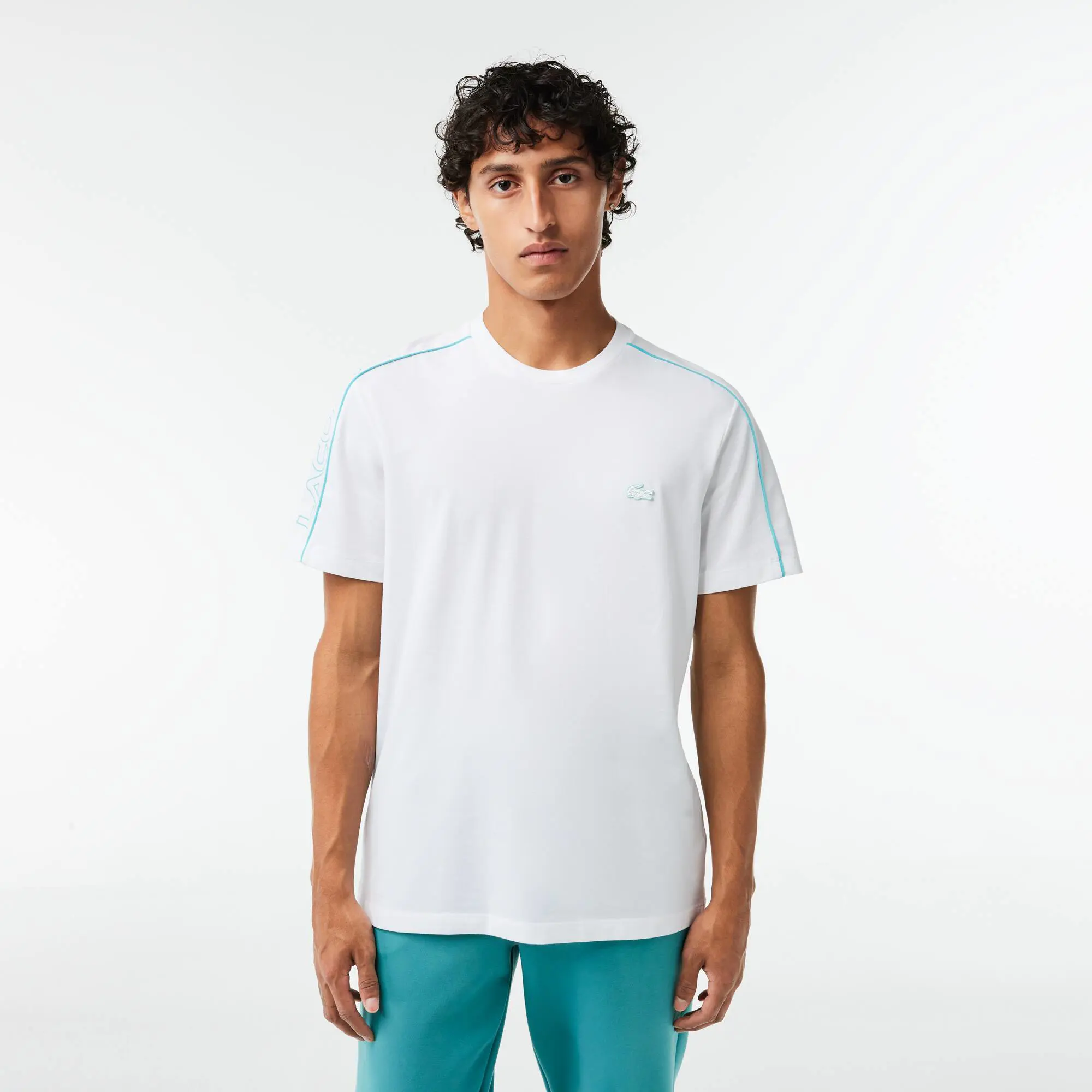 Lacoste T-Shirt aus funktionellem Piqué mit Aufdruck. 1