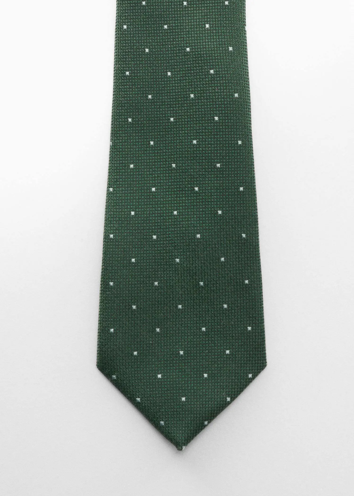 Mango Tie with micro polka-dot structure. a green neck tie with white polka dots. 