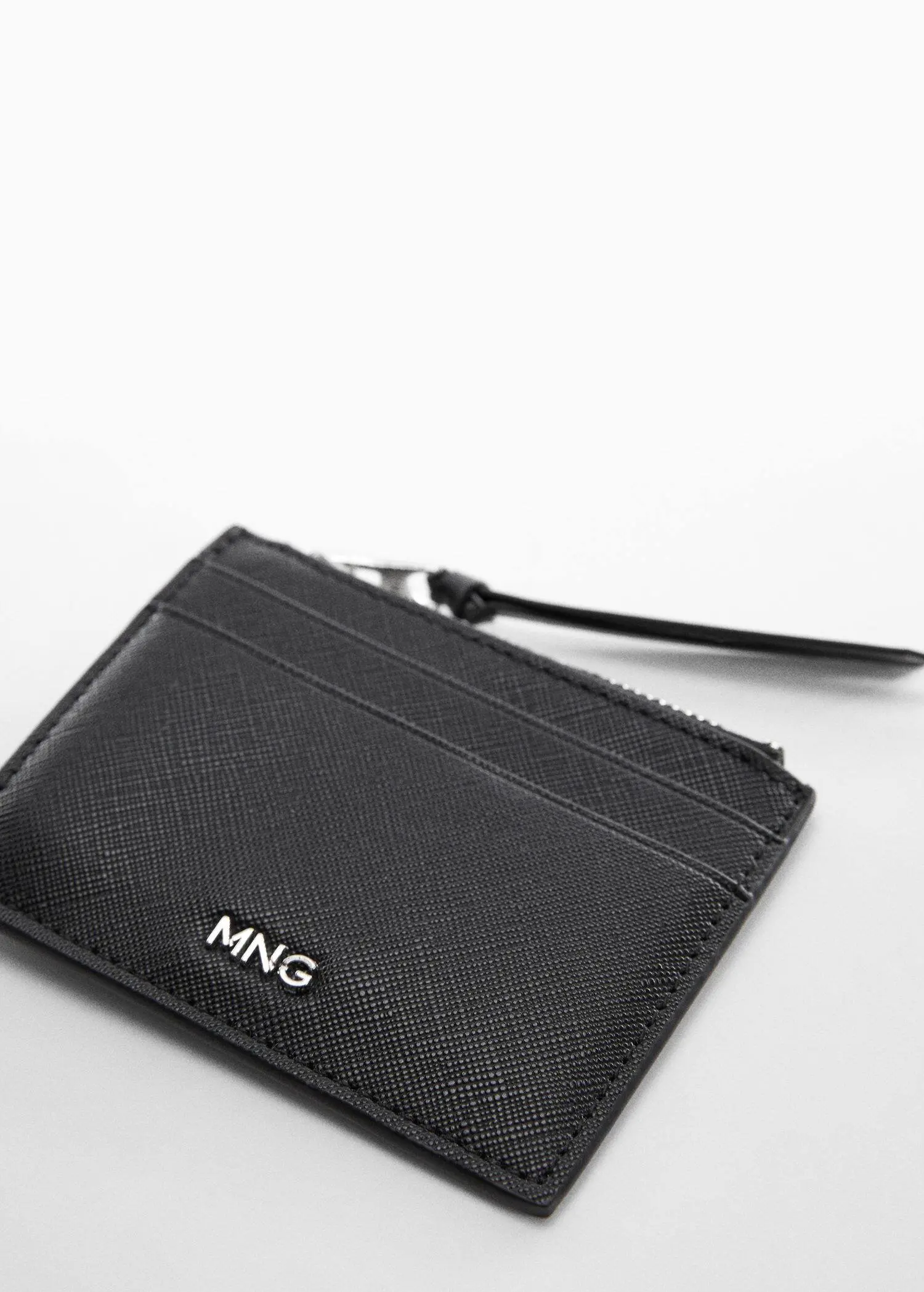 Mango Saffiano-effect cardholder. a close-up of a card holder on a table. 