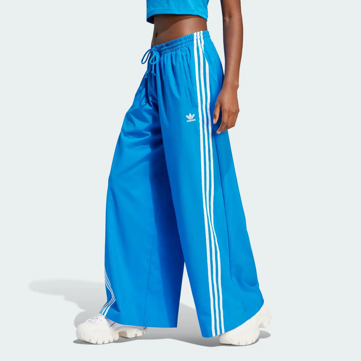 Adidas Adilenium Oversized Tracksuit Bottoms. 1