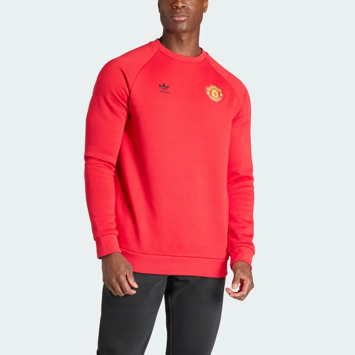 Adidas Manchester United Essentials Trefoil Crew Sweatshirt. 1
