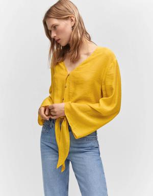 Flared-sleeve blouse with bow