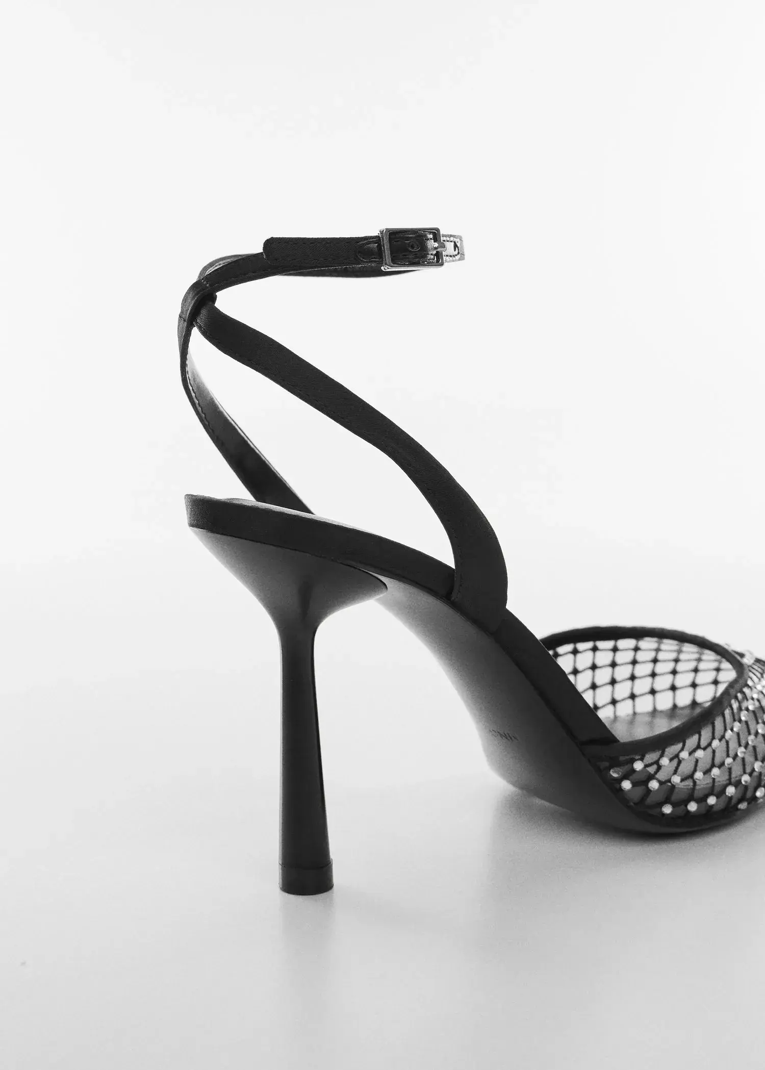 Mango Rhinestone mesh shoe. a close-up of a pair of high heel shoes. 