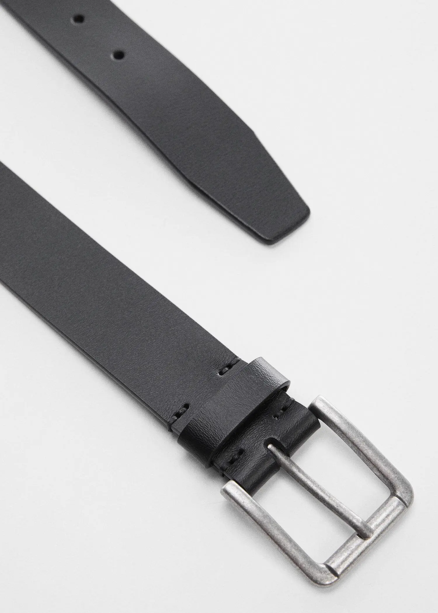 Mango Leather belt with square buckle . a close-up of a black leather belt with a silver buckle. 