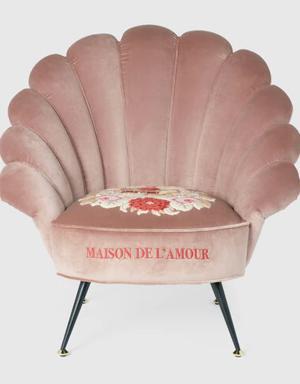 Velvet armchair with embroidered flowers