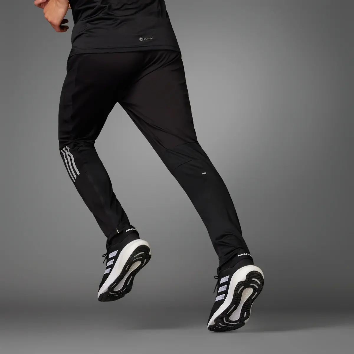 Adidas Pantalon en maille Own the Run Astro. 2