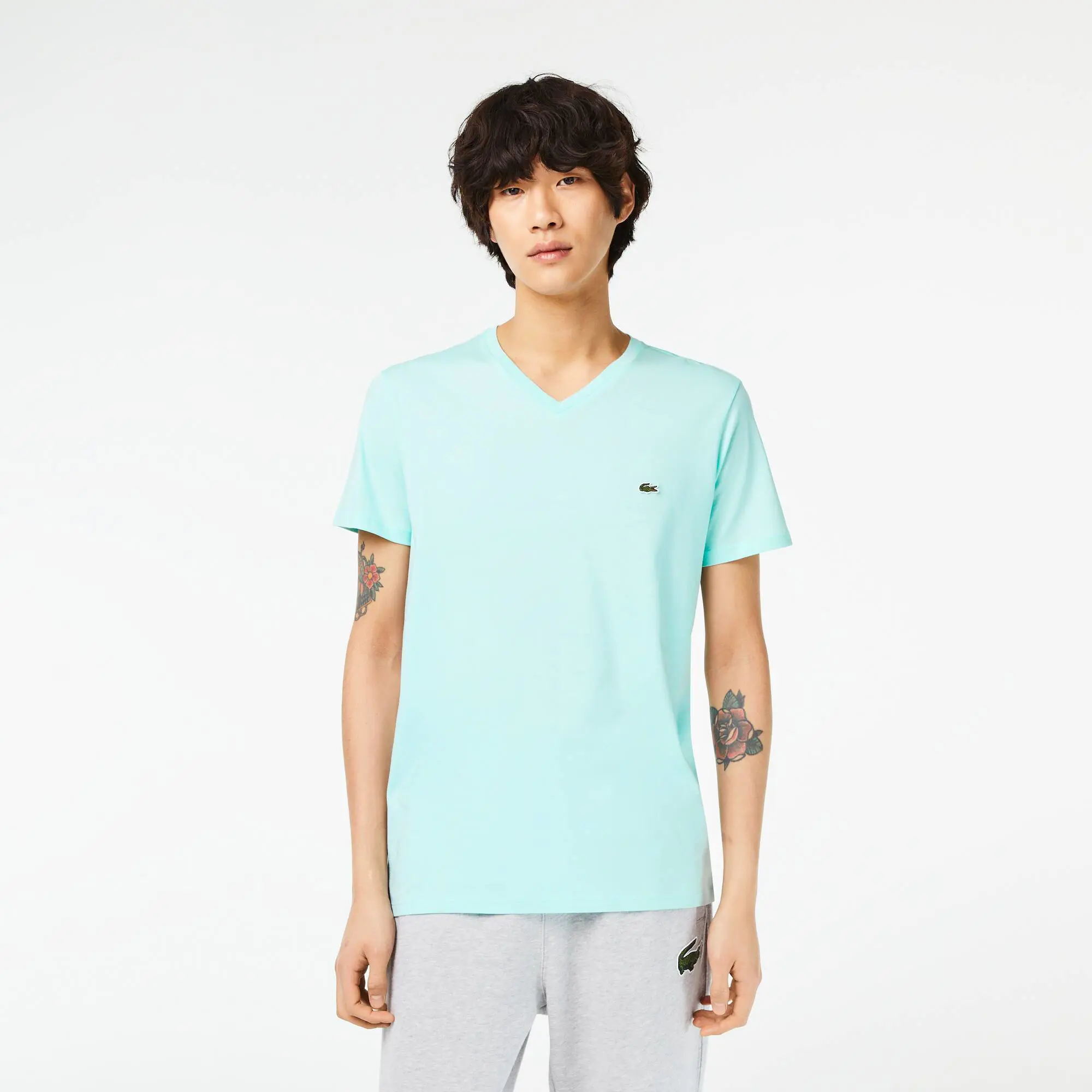 Lacoste Men's V-Neck Pima Cotton Jersey T-Shirt. 1 Lacoste Men's V-Neck Pima Cotton Jersey T-Shirt. 1