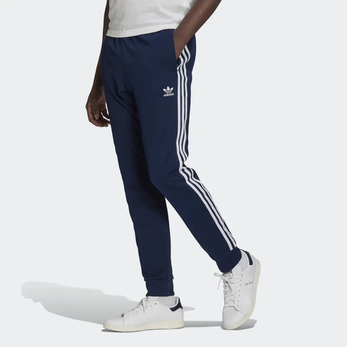 Adidas ADICOLOR CLASSICS PRIMEBLUE SST TRACK PANTS. 1