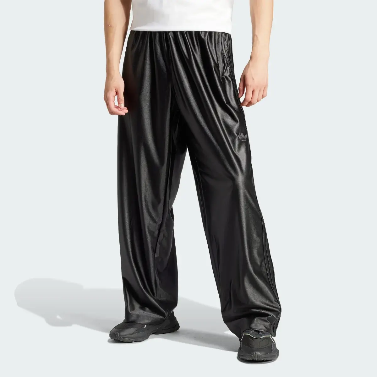 Adidas Pantalon de survêtement oversize Firebird. 1