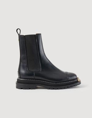 Ankle boots with notched sole Login to add to Wish list