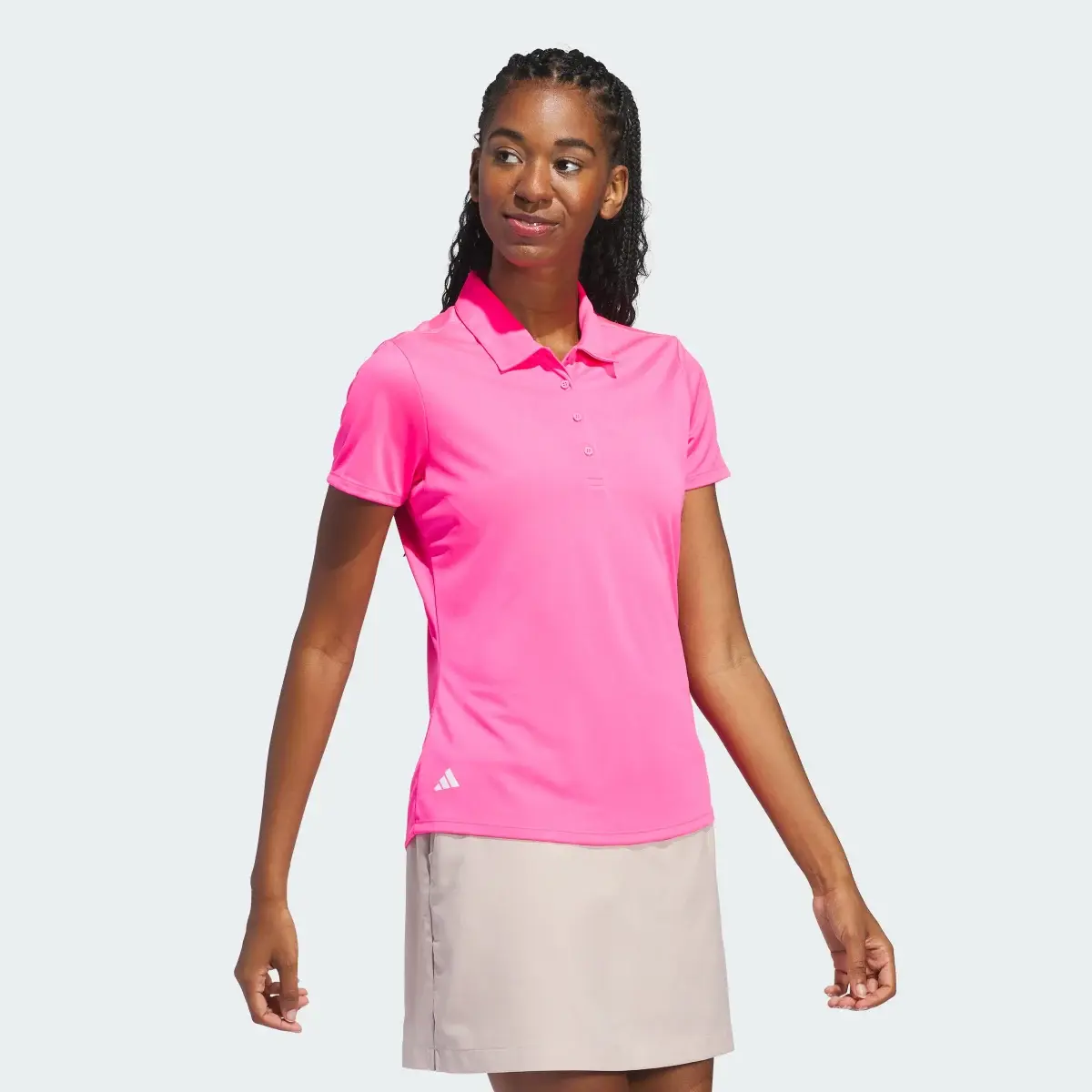 Adidas Women's Solid Performance Short Sleeve Polo Shirt. 2