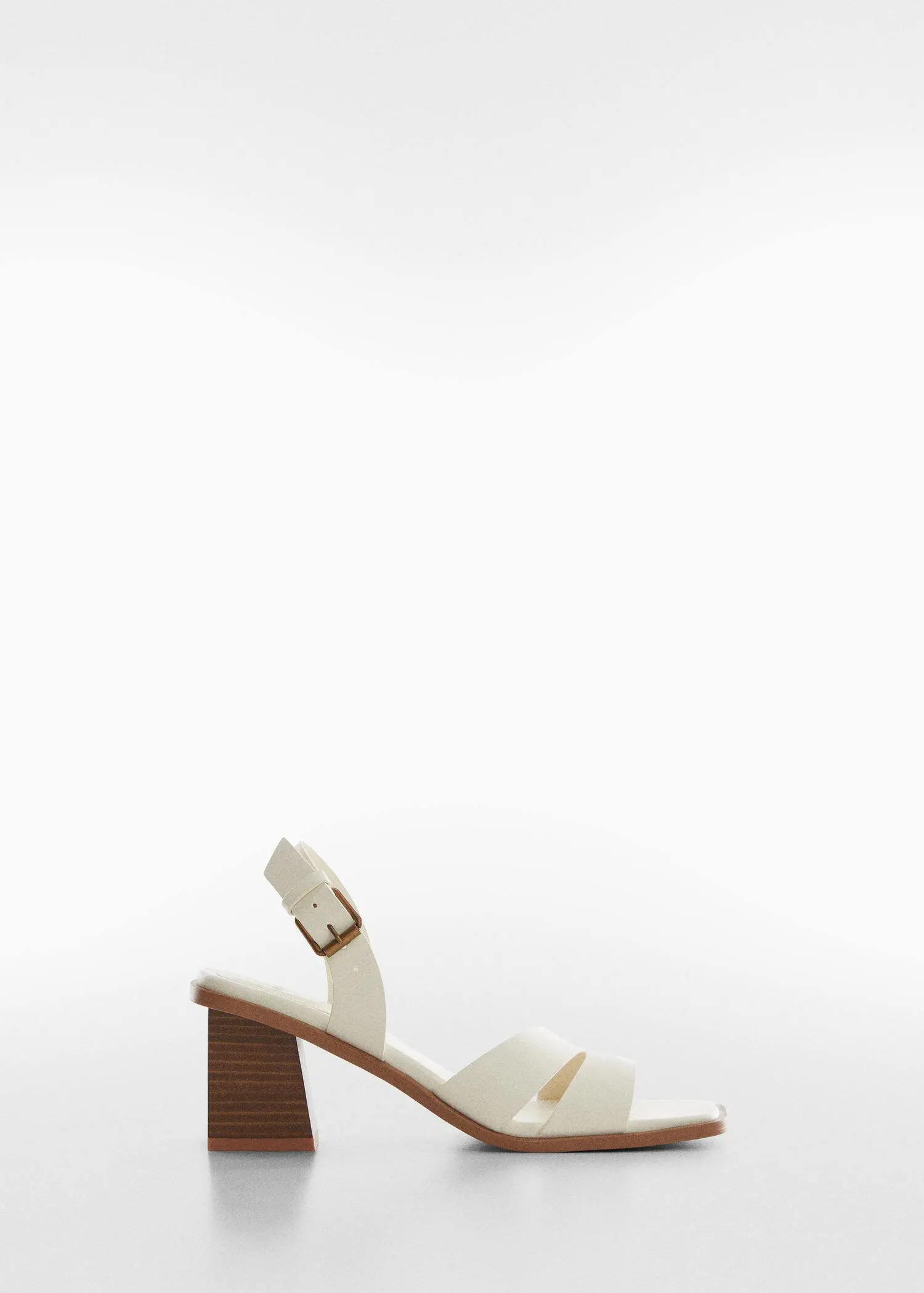 Mango Block-heel sandals. a pair of white shoes on a white background. 