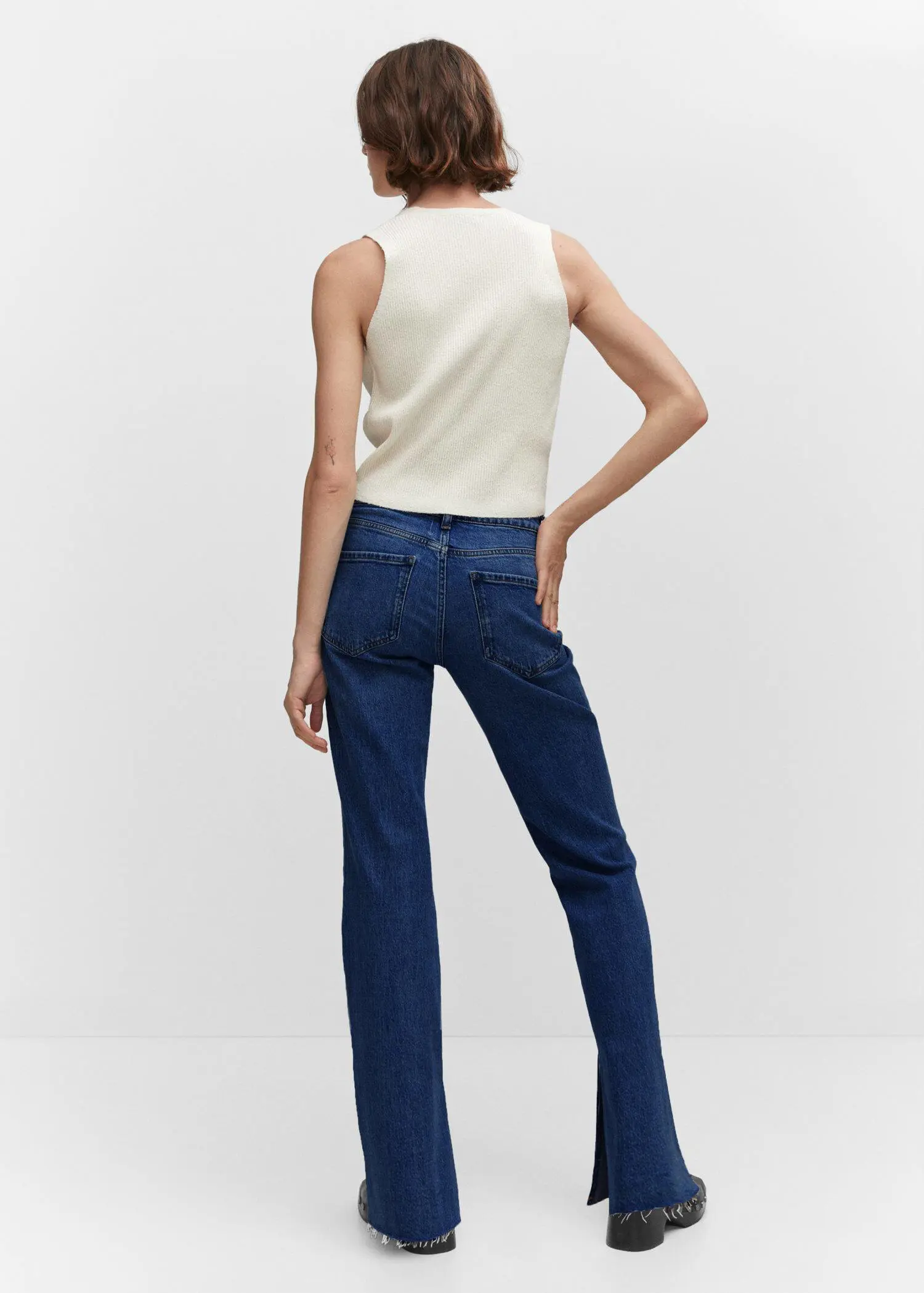 Mango Mid-waist flared jeans with slits. 3