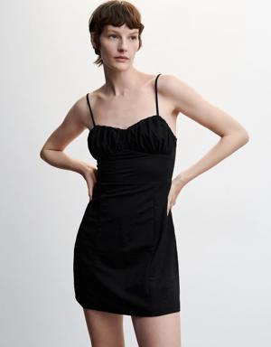 Short dress with ruched neckline