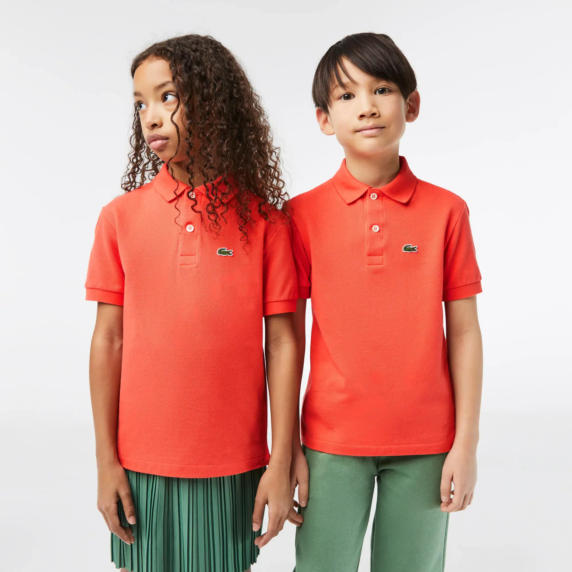 Lacoste Polo enfant Lacoste regular fit en petit piqué uni. 1