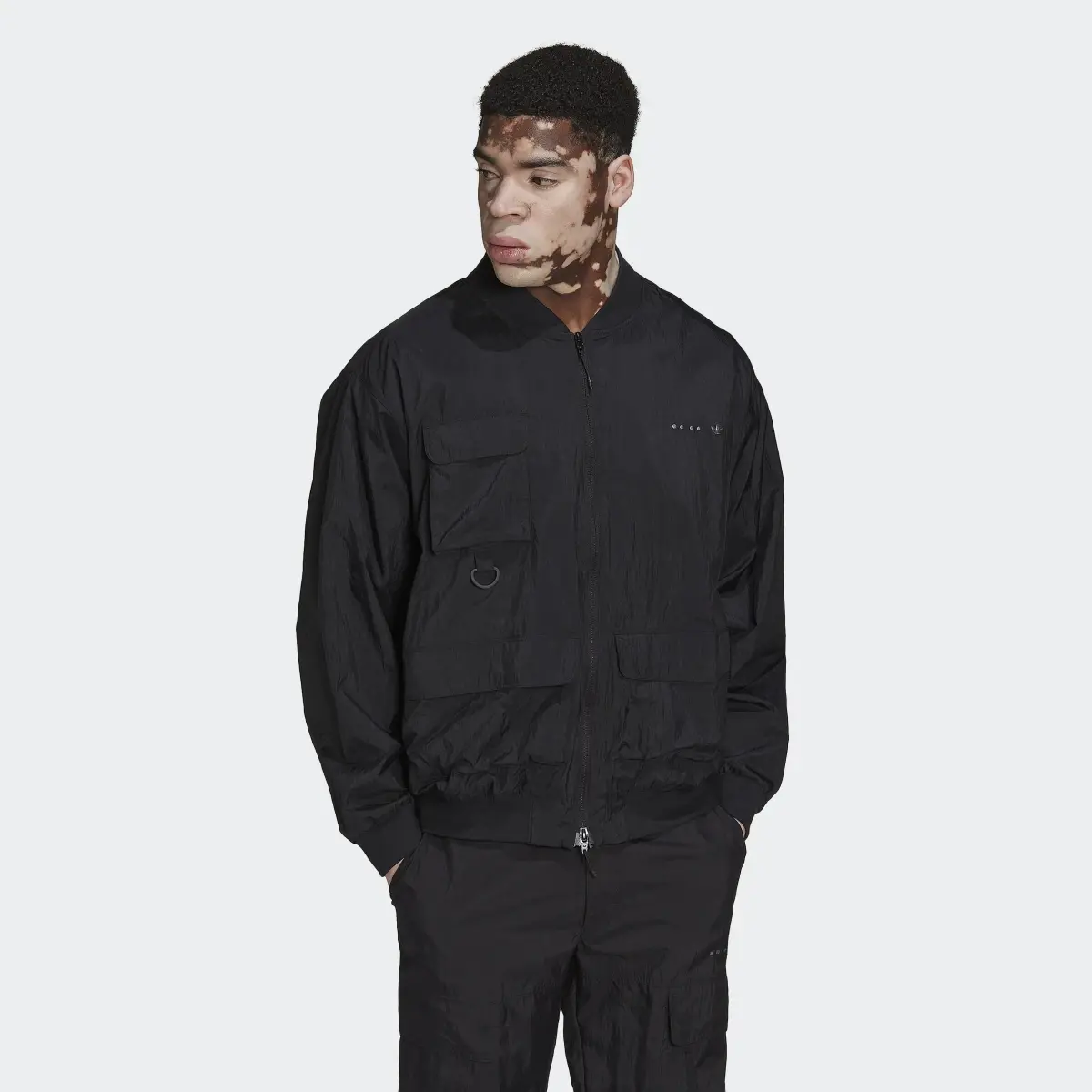 Adidas Reveal Cargo Track Top. 2