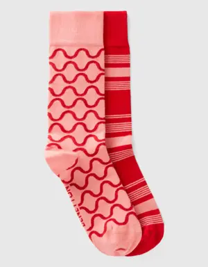 two pairs of pink and red socks