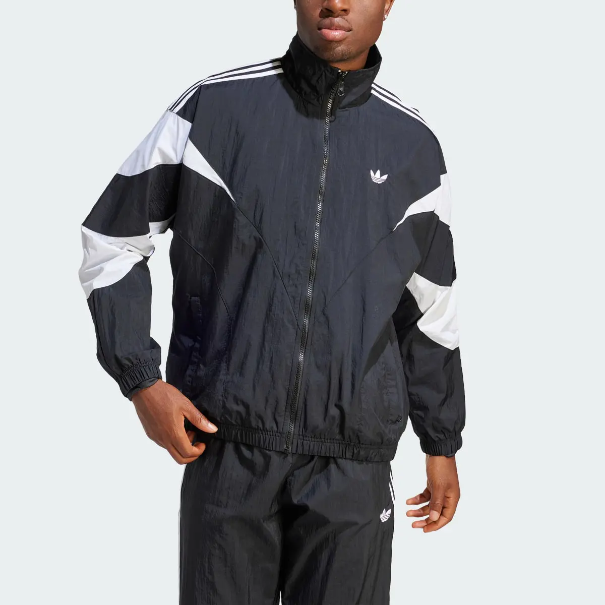 Adidas Rekive Woven Track Jacket. 1