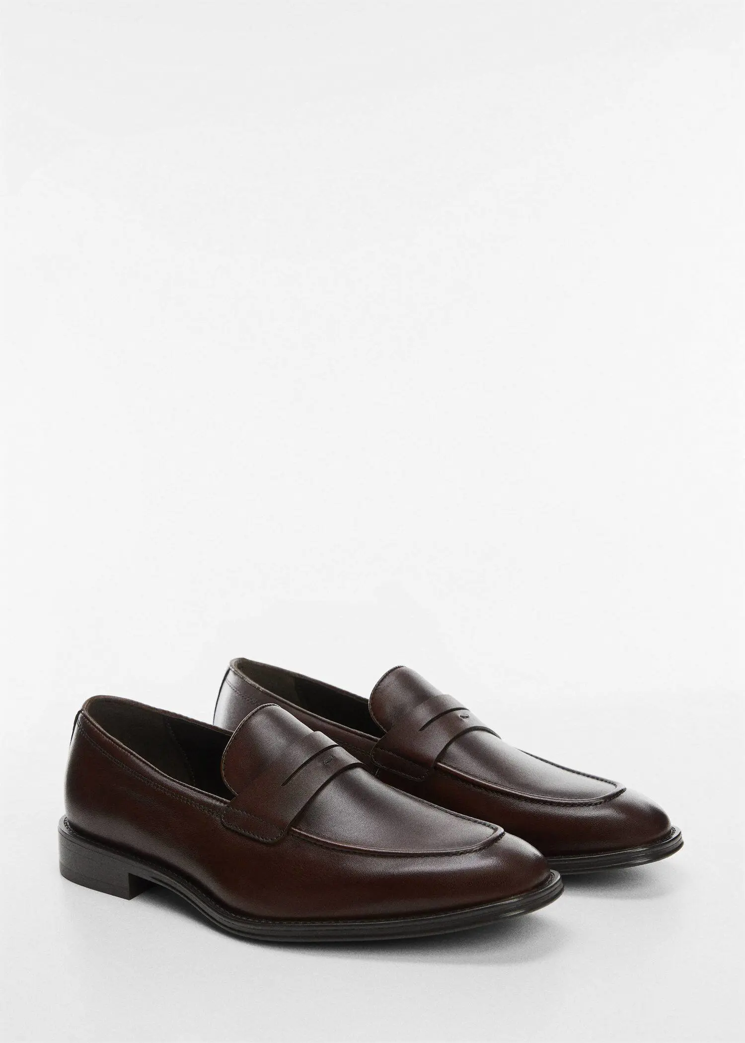 Mango Aged-leather loafers. a pair of brown loafers on a white background. 