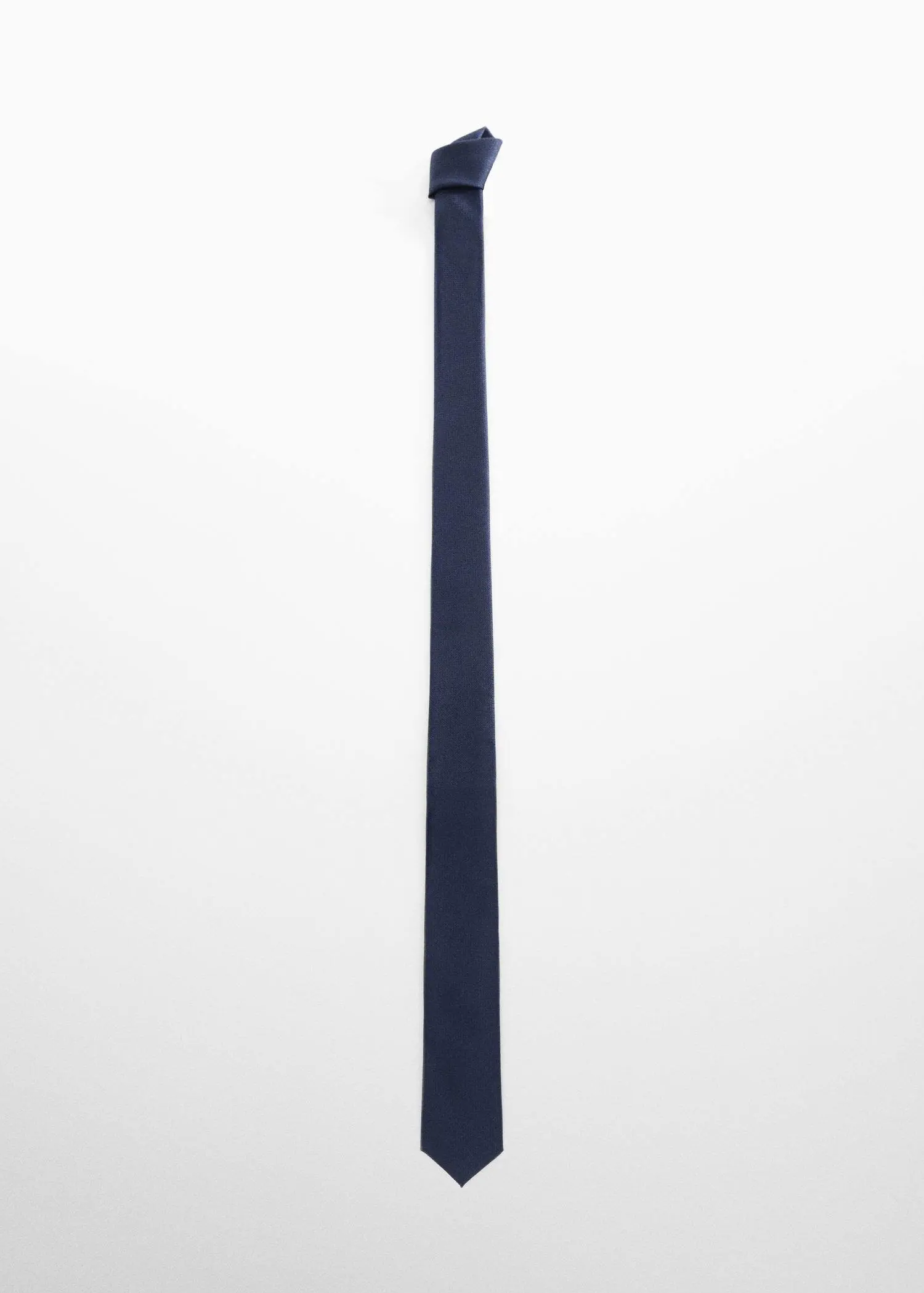 Mango Narrow structured tie. a tall pole that is in the middle of a field 