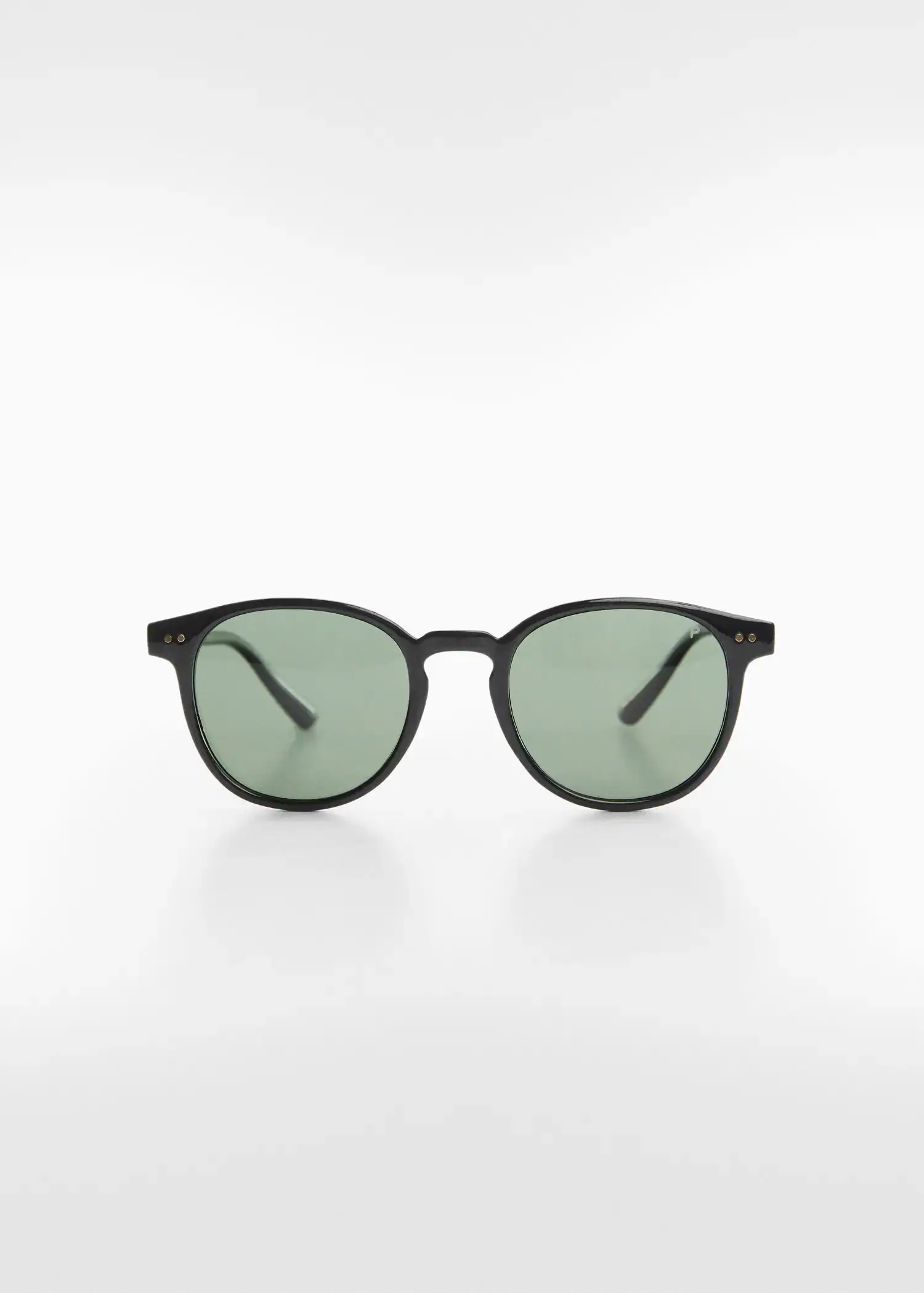 Mango Polarised sunglasses. a pair of green sunglasses sitting on top of a table. 